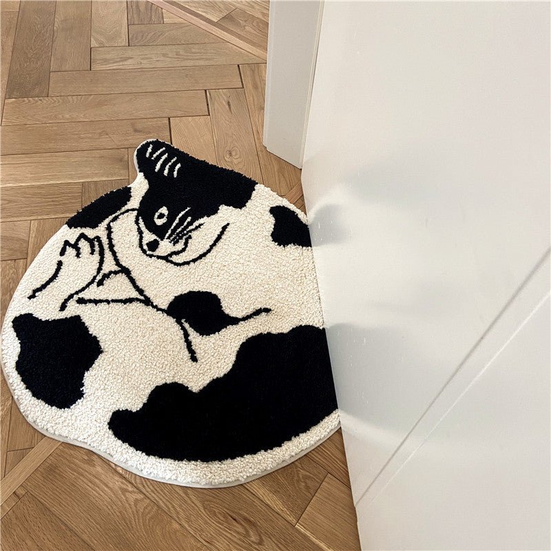 http://patchandbagel.com/cdn/shop/products/curled-cat-rug-734892.jpg?v=1661774909