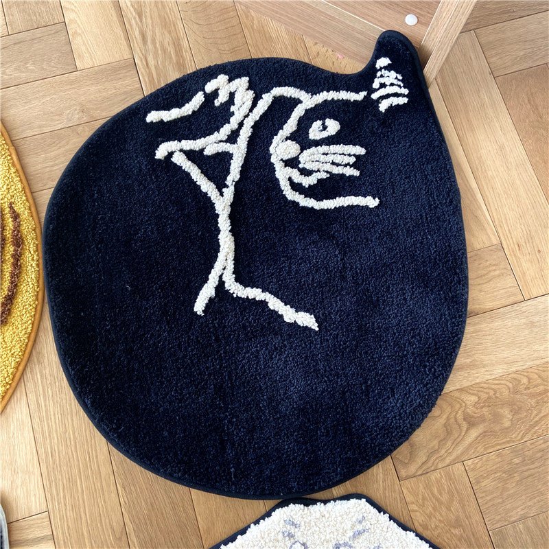 https://patchandbagel.com/cdn/shop/products/curled-cat-rug-129647.jpg?v=1661774909