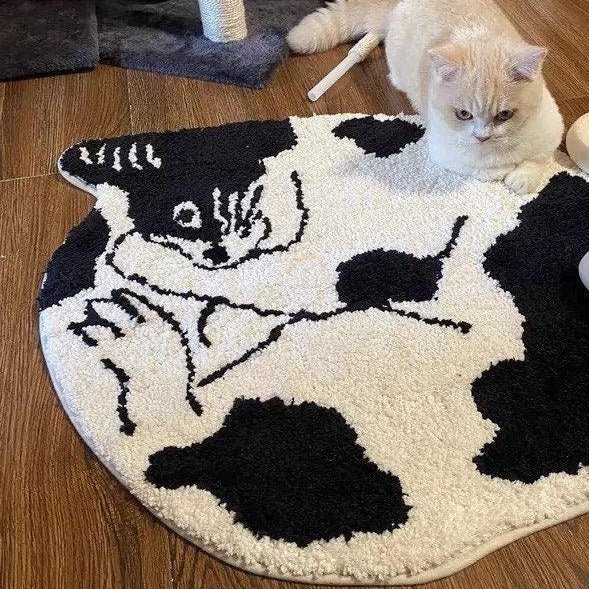 https://patchandbagel.com/cdn/shop/products/curled-cat-rug-828690.jpg?v=1661774909